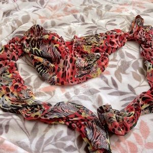 Animal print cropped long sleeve top. Never worn.